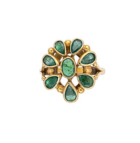 Lot 7 - An 18ct gold emerald cluster ring