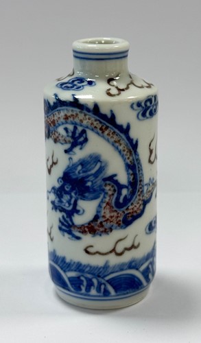 Lot 27 - A Chinese copper-red and underglaze blue snuff bottle, late Qing dynasty