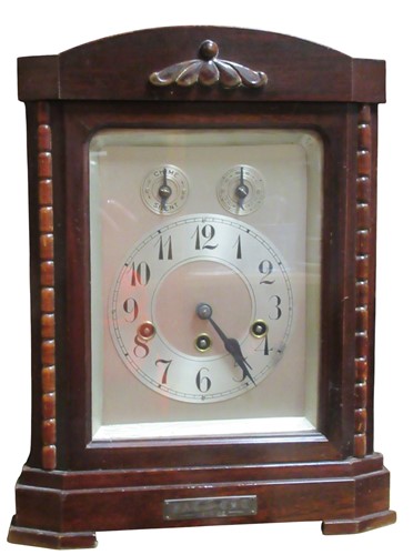 Lot 141 - A 1920s chiming mantle clock, the silvered...