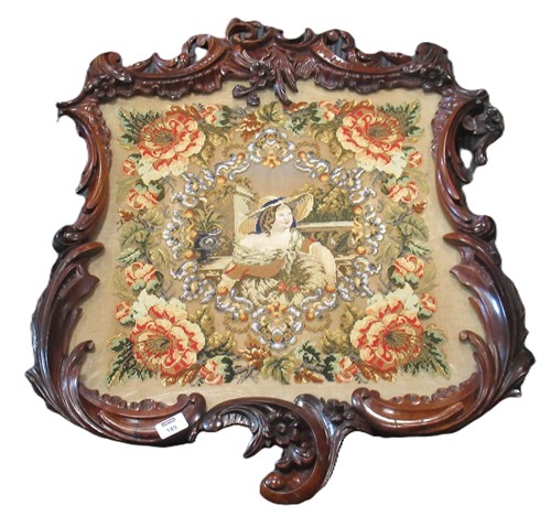 Lot 203 - A Victorian needlework, depicting a lady in a...