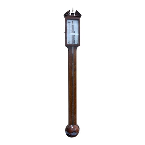 Lot 759 - A mahogany stick barometer with broken...