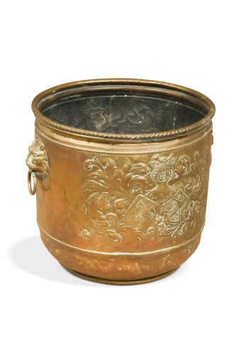 Lot 525 - An embossed brass log bin, 19th century