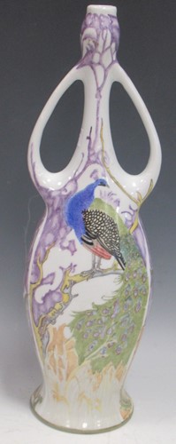 Lot 20 - Dutch twin-handled vase painted with peacocks...
