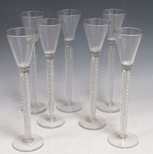 Lot 13 - An early 20th century set of seven tall air...