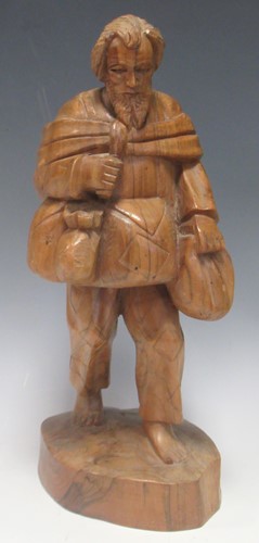 Lot 133 - A carved chestnut or walnut standing figure of...