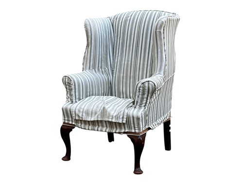 Lot 650 - A 19th century walnut wing armchair with...