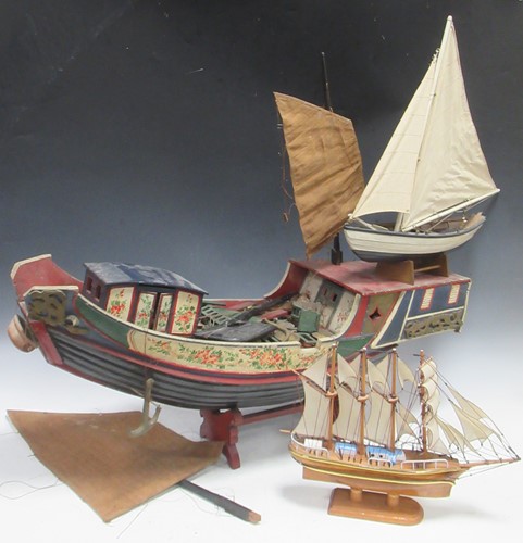 Lot 234 - A polychrome painted wooden model of a Chinese...