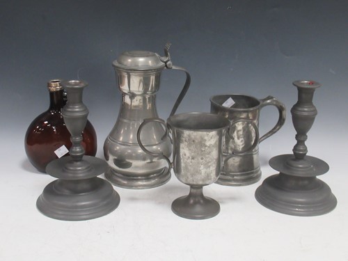Lot 204 - Items of pewter to include a pair of...
