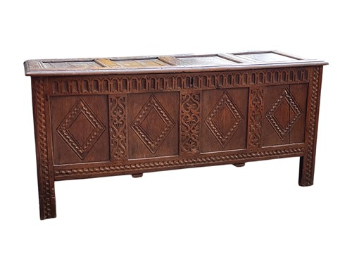 Lot 541 - A late 17th century four panelled oak coffer,...
