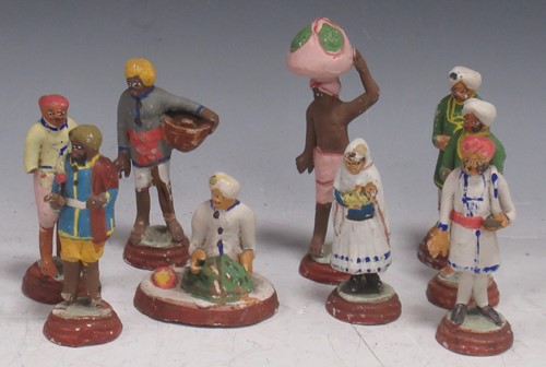 Lot 170 - A collection of Indian terracotta figures,...