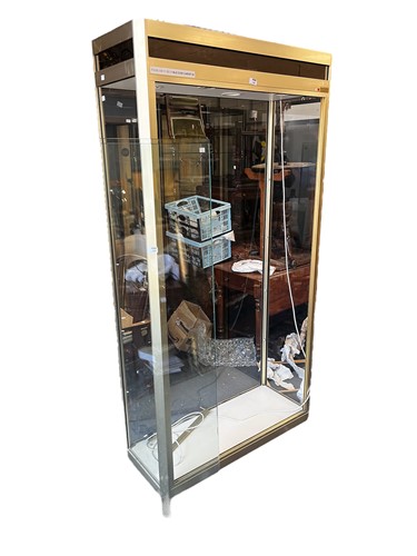 Lot 683 - A modern glazed display cabinet with locking...