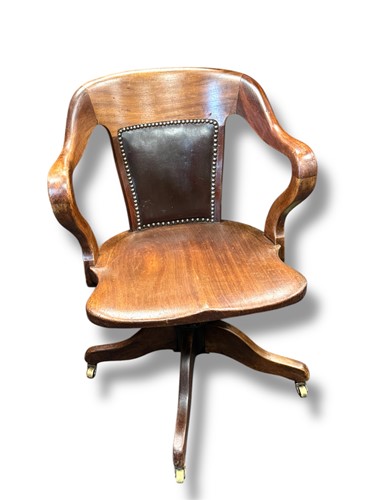Lot 589 - A 19th century revolving desk chair with...