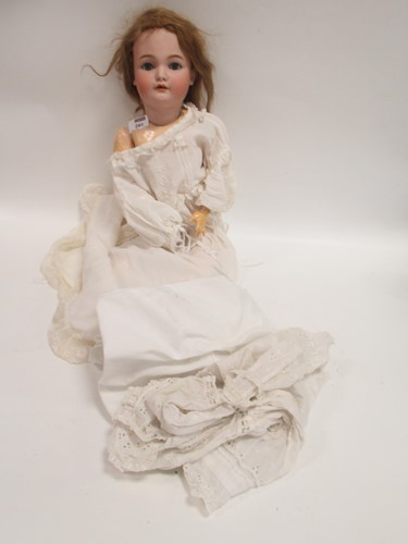 Lot 151 - An early 20th century bisque headed doll 55cm...