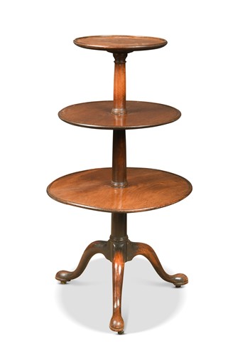 Lot 519 - A George III mahogany three tier dumb waiter