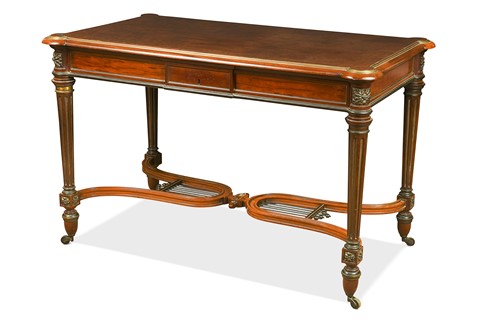 Lot 527 - A Louis XVI style mahogany library table