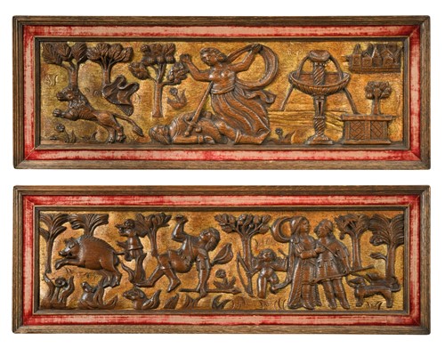 Lot 383 - A near pair of Flemish 17th century style parcel-gilt carved oak panels, probably 19th century