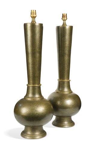 Lot 637 - A pair of damascened brass lamps, 20th century