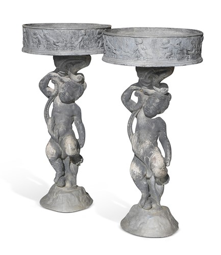 Lot 601 - A pair of lead cherub figures, late 19th century