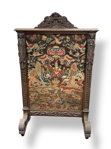 Lot 418 - A carved oak screen with needlework panel, the...