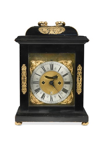 Lot 335 - An ebonised table clock signed William Tomlinson, London, circa 1700