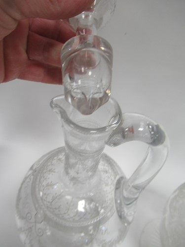 Lot 5 - A 19th century glass ewer with engraved...