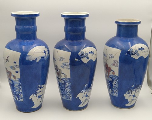 Lot 28 - A garniture of three Chinese powder blue ground vases, Qing Dynasty, 18th/19th century