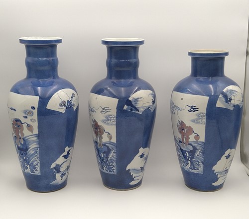 Lot 28 - A garniture of three Chinese powder blue ground vases, Qing Dynasty, 18th/19th century