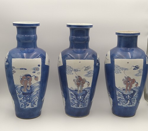 Lot 28 - A garniture of three Chinese powder blue ground vases, Qing Dynasty, 18th/19th century