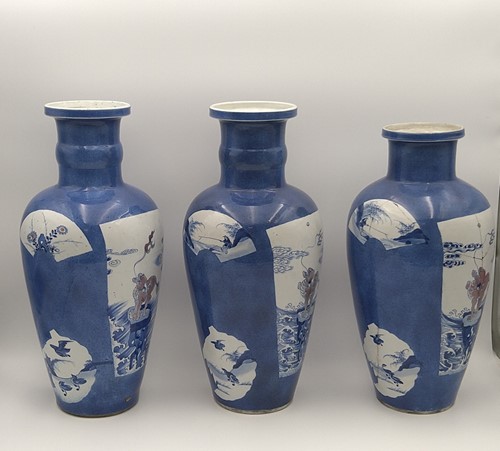 Lot 28 - A garniture of three Chinese powder blue ground vases, Qing Dynasty, 18th/19th century