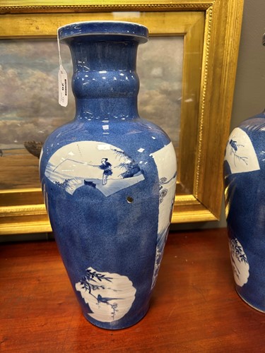 Lot 28 - A garniture of three Chinese powder blue ground vases, Qing Dynasty, 18th/19th century