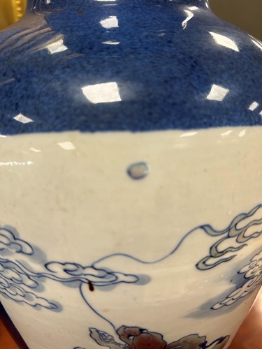 Lot 28 - A garniture of three Chinese powder blue ground vases, Qing Dynasty, 18th/19th century