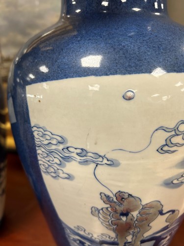 Lot 28 - A garniture of three Chinese powder blue ground vases, Qing Dynasty, 18th/19th century