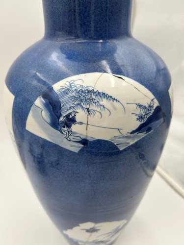 Lot 28 - A garniture of three Chinese powder blue ground vases, Qing Dynasty, 18th/19th century