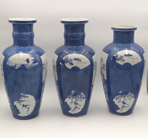 Lot 28 - A garniture of three Chinese powder blue ground vases, Qing Dynasty, 18th/19th century