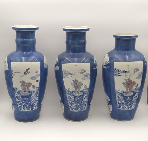 Lot 28 - A garniture of three Chinese powder blue ground vases, Qing Dynasty, 18th/19th century
