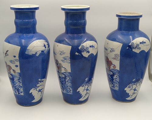 Lot 28 - A garniture of three Chinese powder blue ground vases, Qing Dynasty, 18th/19th century