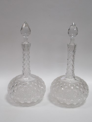 Lot 92 - A pair of cut glass decanters of sphere and...