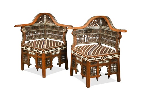 Lot 440 - A pair of North African bone and ebony inlaid corner chairs, early 20th century