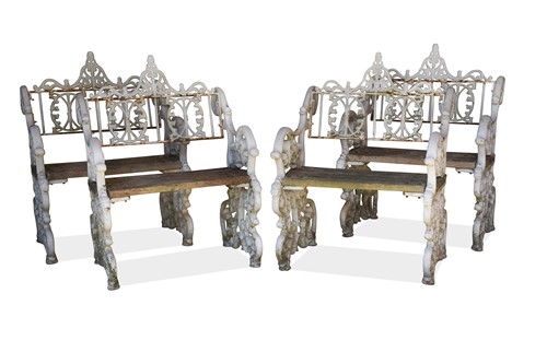 Lot 600 - A set of four cast iron garden chairs, early 20th century