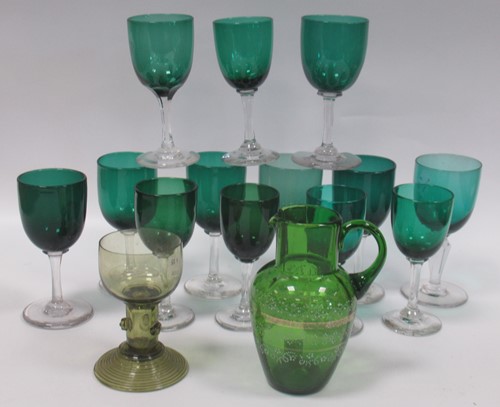Lot 8 - A Harlequin set of deep green stemmed wine...