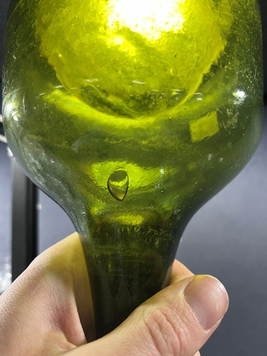 Lot 9 - A group of 18th century bottles, onion shaped...