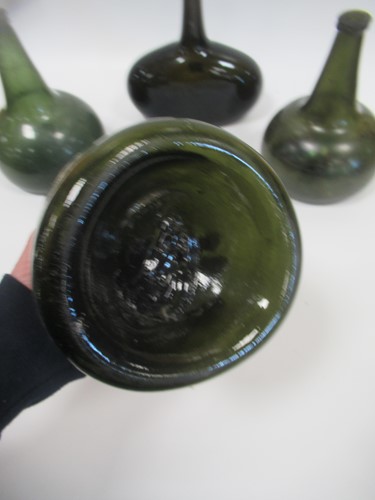 Lot 9 - A group of 18th century bottles, onion shaped...