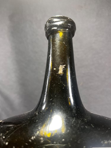 Lot 9 - A group of 18th century bottles, onion shaped...