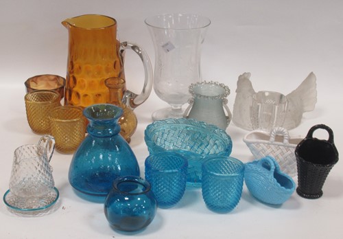 Lot 95 - A dimpled Victorian hand blown jug; turquoise...