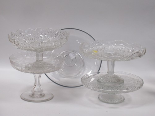 Lot 58 - An engraved cake stand or tazza with all over...