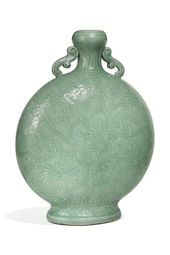 Lot 14 - A Chinese celadon glazed and carved large moonflask, Qing Dynasty, 18th century