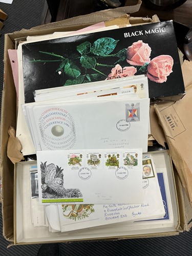 Lot 233 - A collection of stamps contained in two albums and various boxes