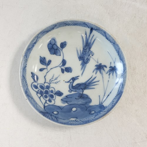 Lot 25 - Four Chinese export blue and white tea bowls and saucers from the Ca Mau cargo, 18th century