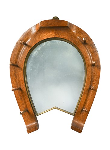Lot 666 - A Victorian oak novelty hall mirror