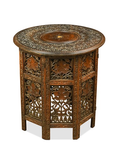 Lot 519 - An Indian hardwood folding table, early 20th century